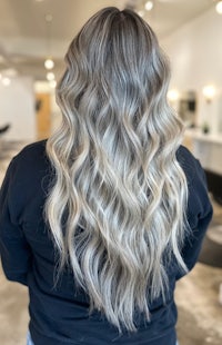 the back of a woman's hair in a salon