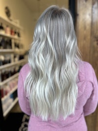 the back of a woman's hair in a salon
