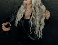 a blonde woman with long wavy hair